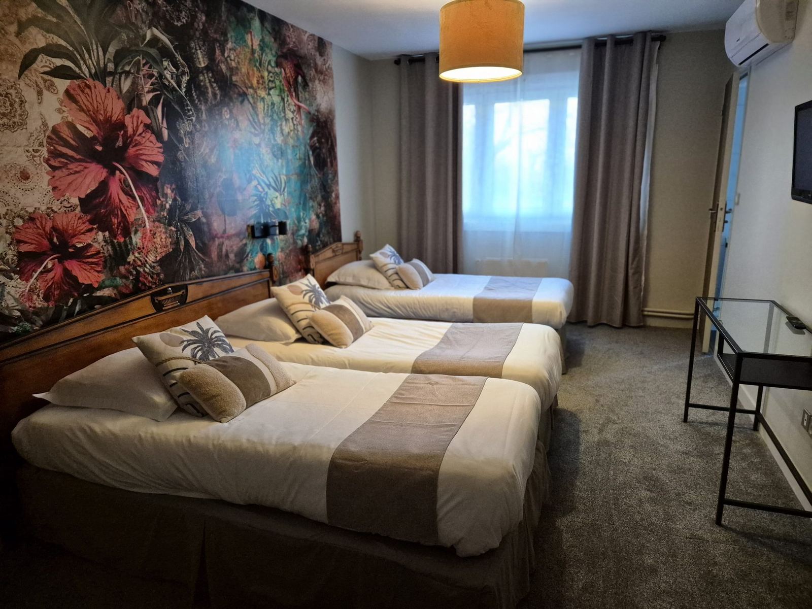 Chambre triple, trois lits séparés